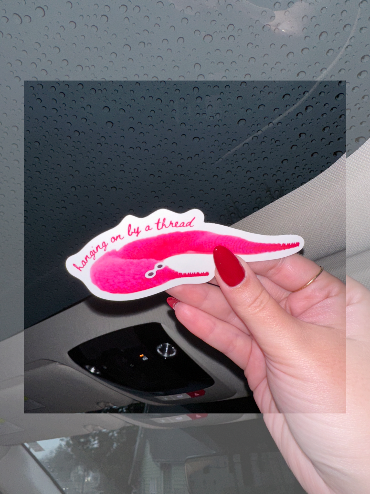Hanging On By A Thread | Worm On A String 3" Vinyl Sticker