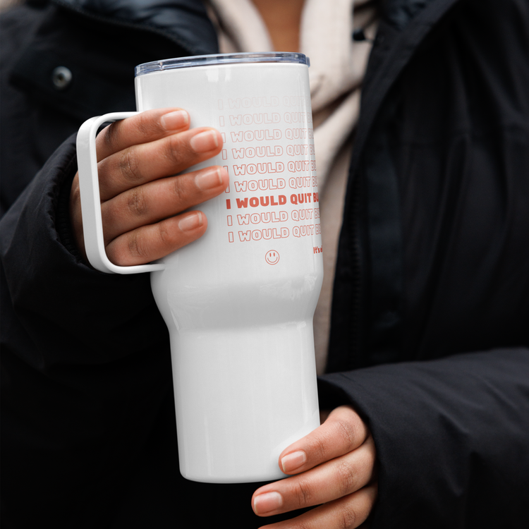 A person holds a large white travel mug in both hands. One of their hands holds the bottom while the other is slipped into the handle. The cup has repeating red text that says, "I would quit but my dog has expensive taste."